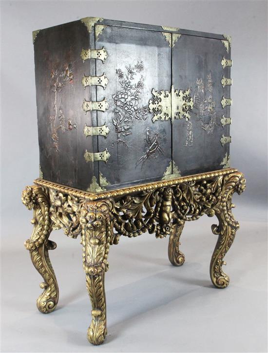An early 18th century japanned cabinet, by repute formerly the property of Clive of India, W.3ft 10in. D.2ft H.5ft